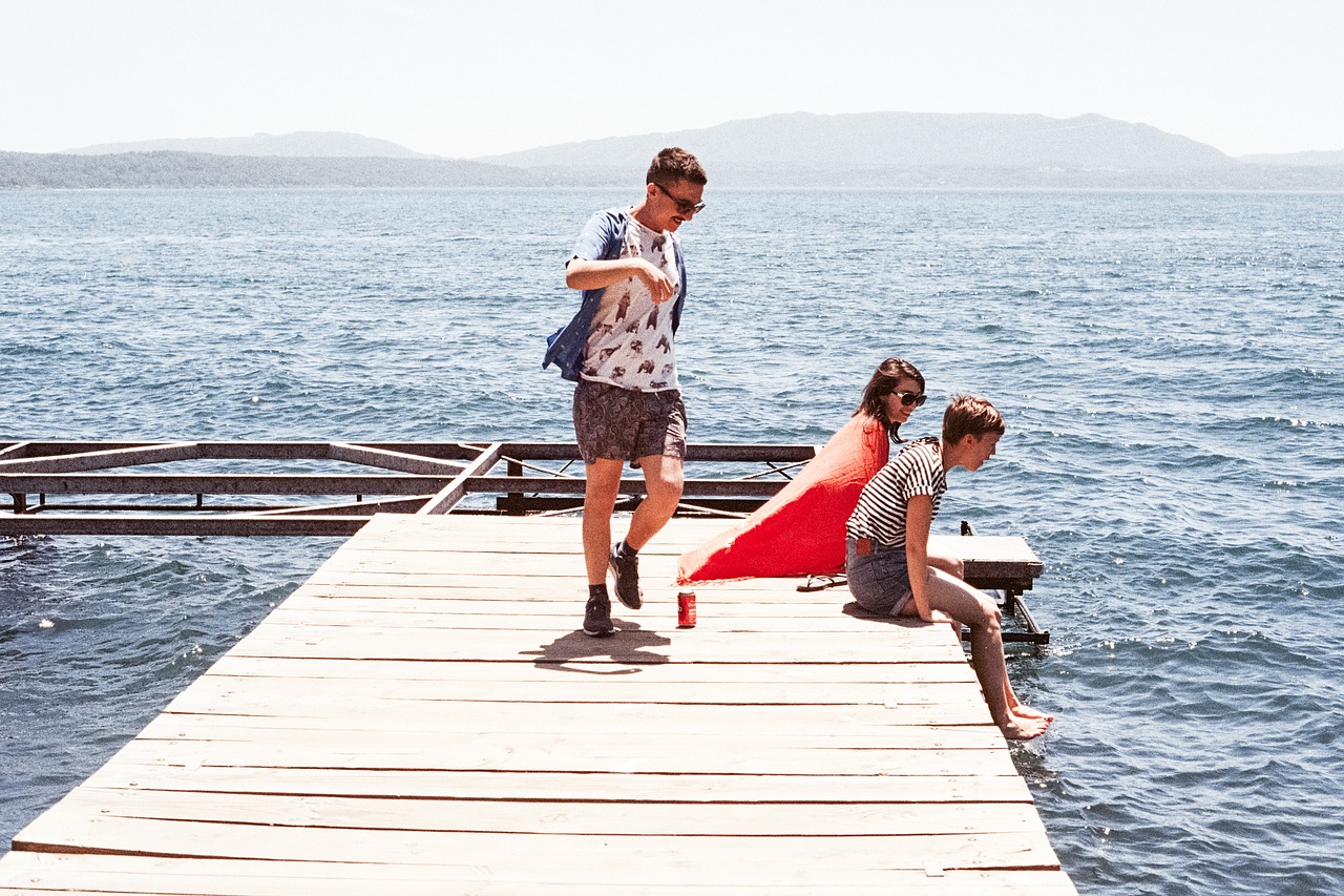 Image - people dock lake water sunshine