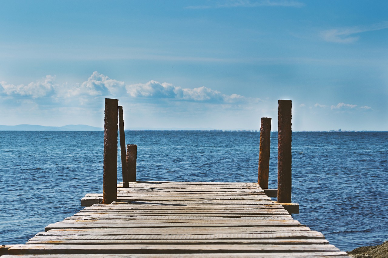 Image - dock lake water blue sky clouds
