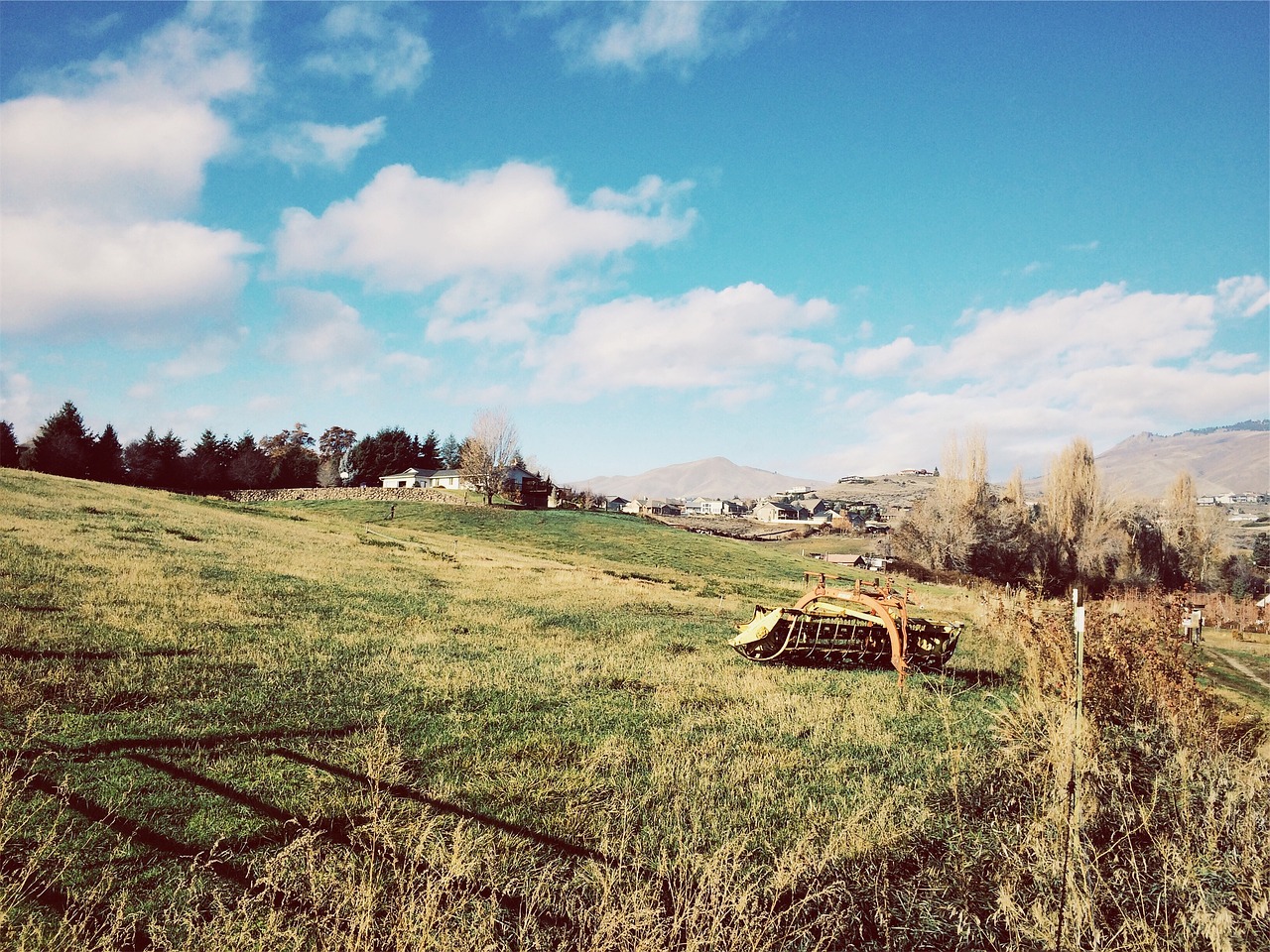 Image - rural houses grass fields hills