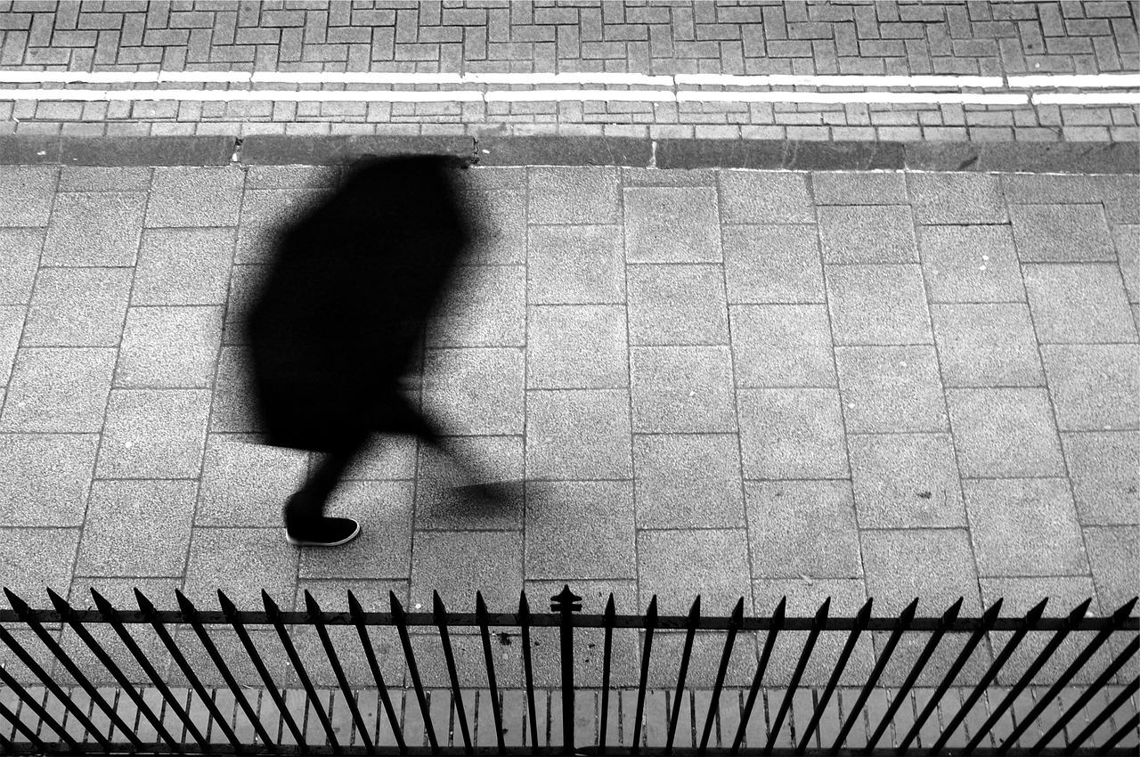 Image - pedestrian walking umbrella