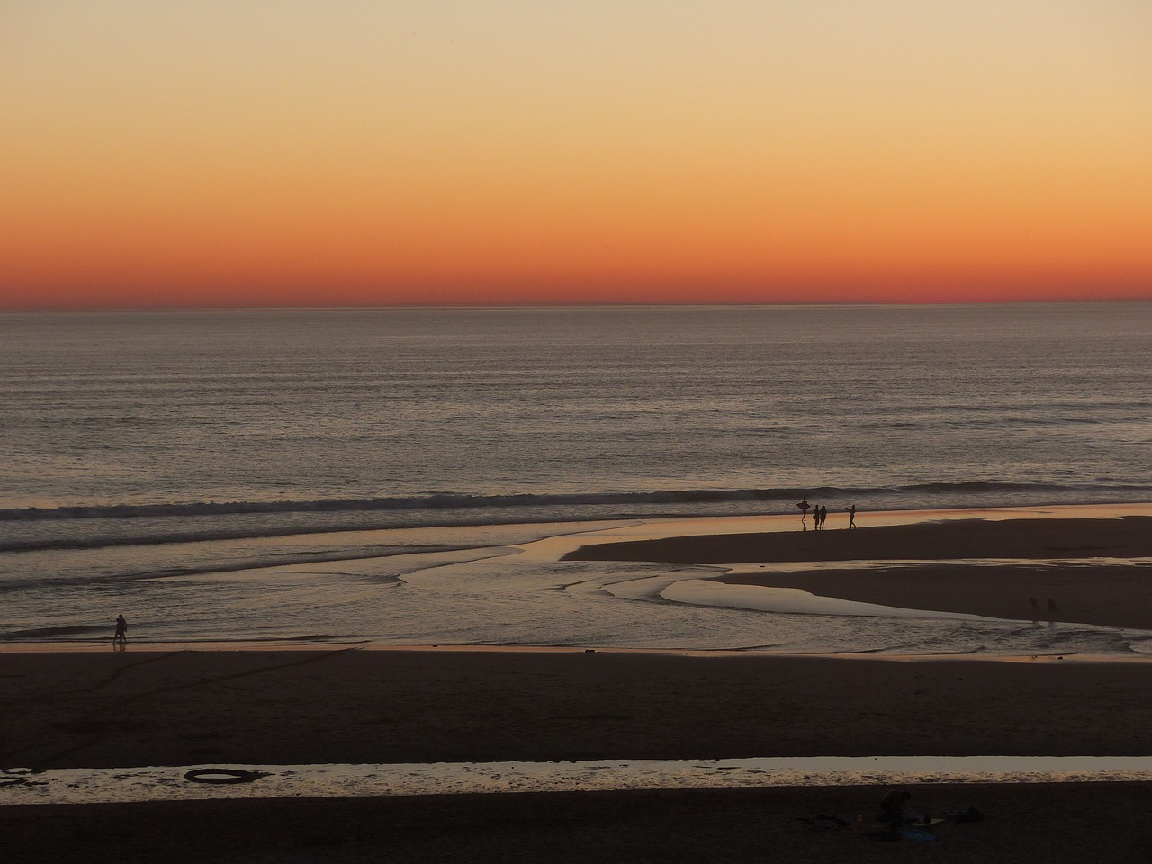 Image - beach setting sunset sea sky sand