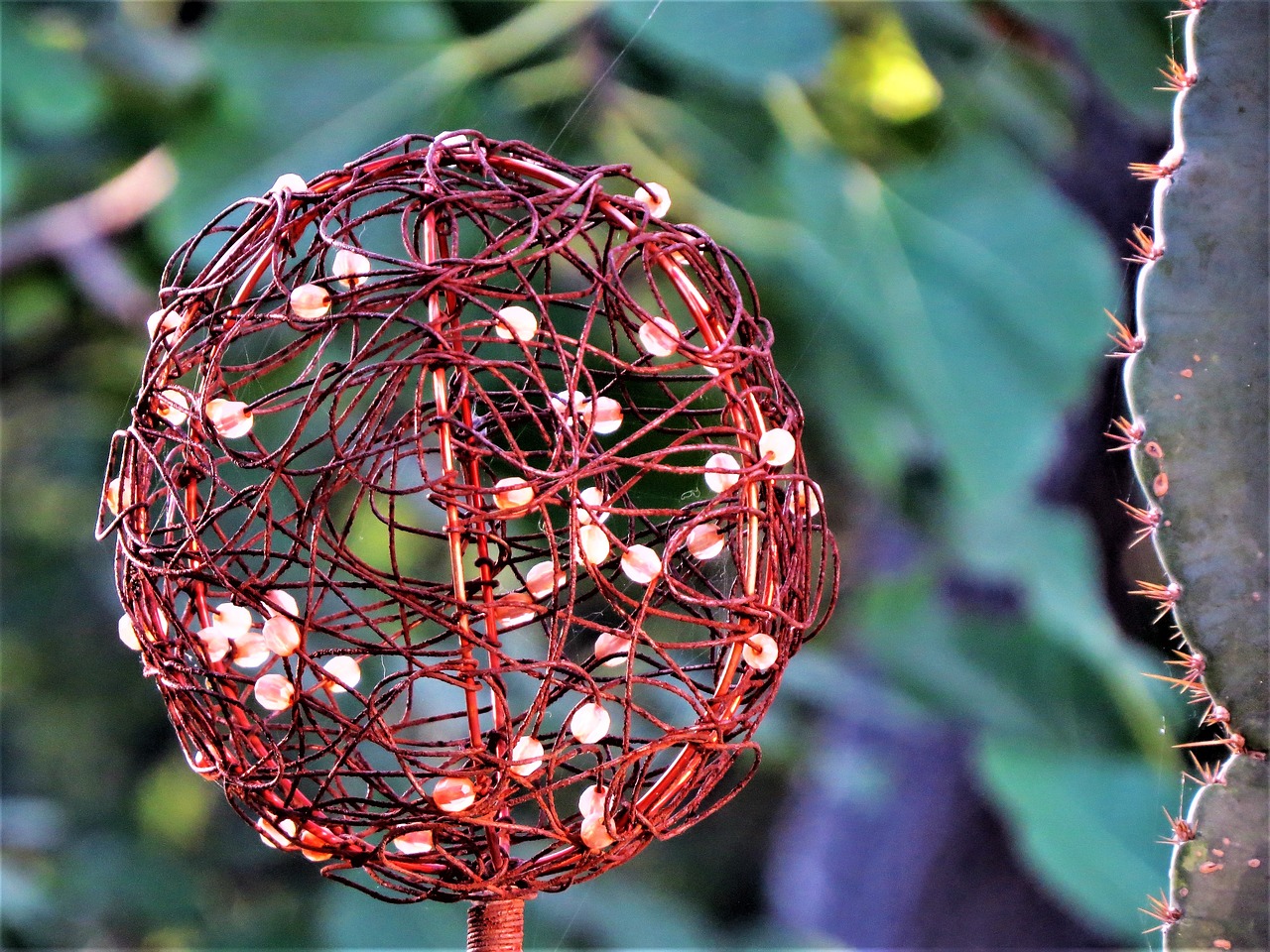 Image - sphere yard art sunset