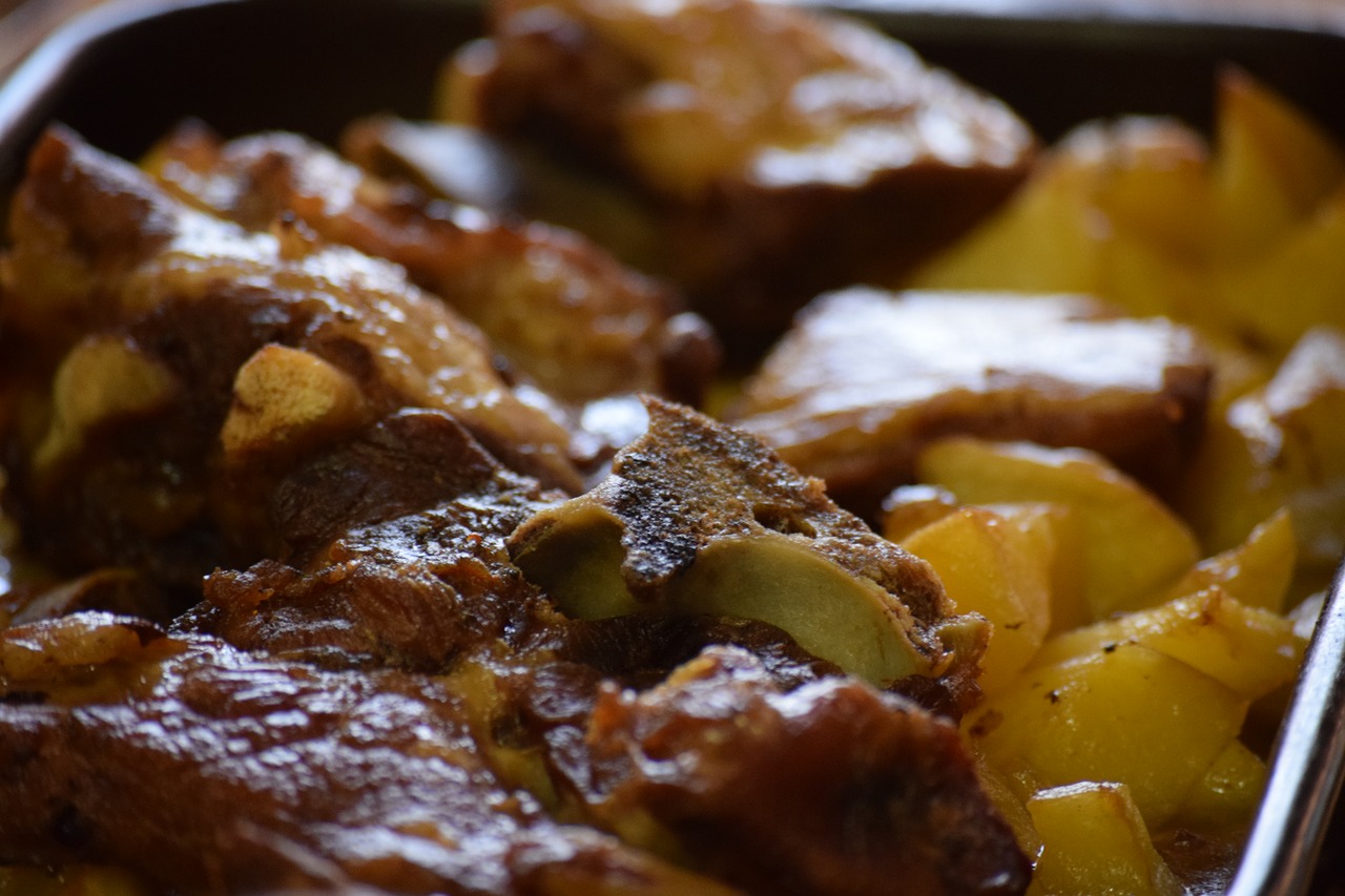 Image - main course baked meat and potatoes