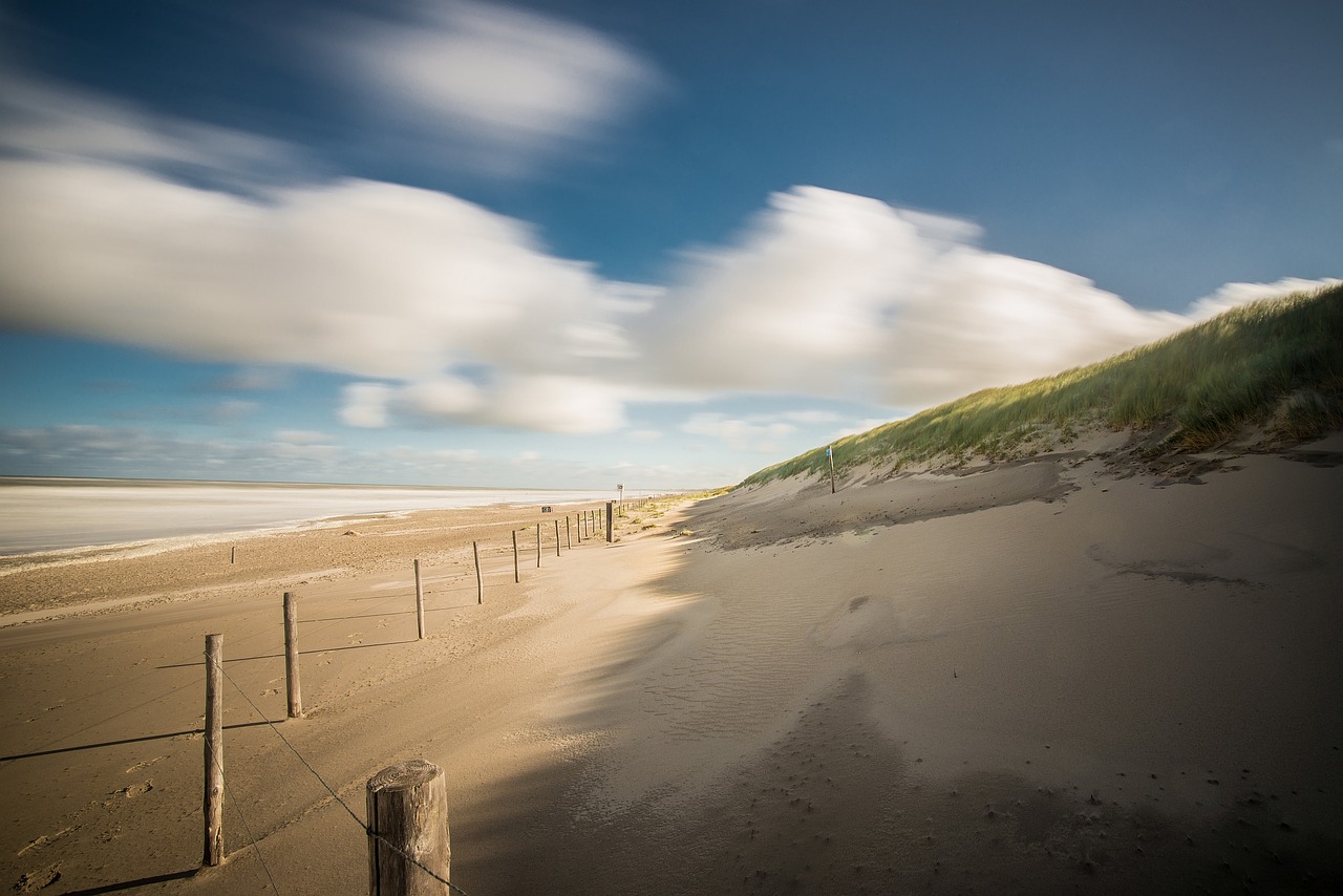 Image - beach sand dune wind clouds