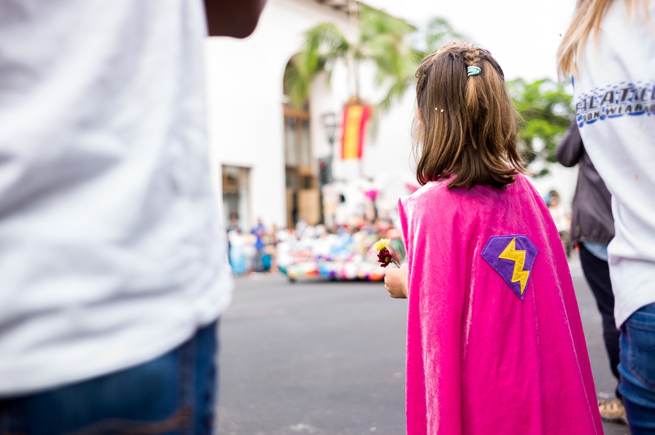 Image - young girl pink cape