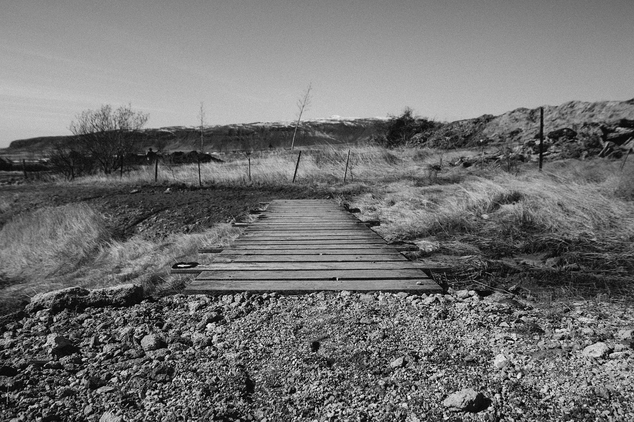 Image - wood bridge rocks dirt fields