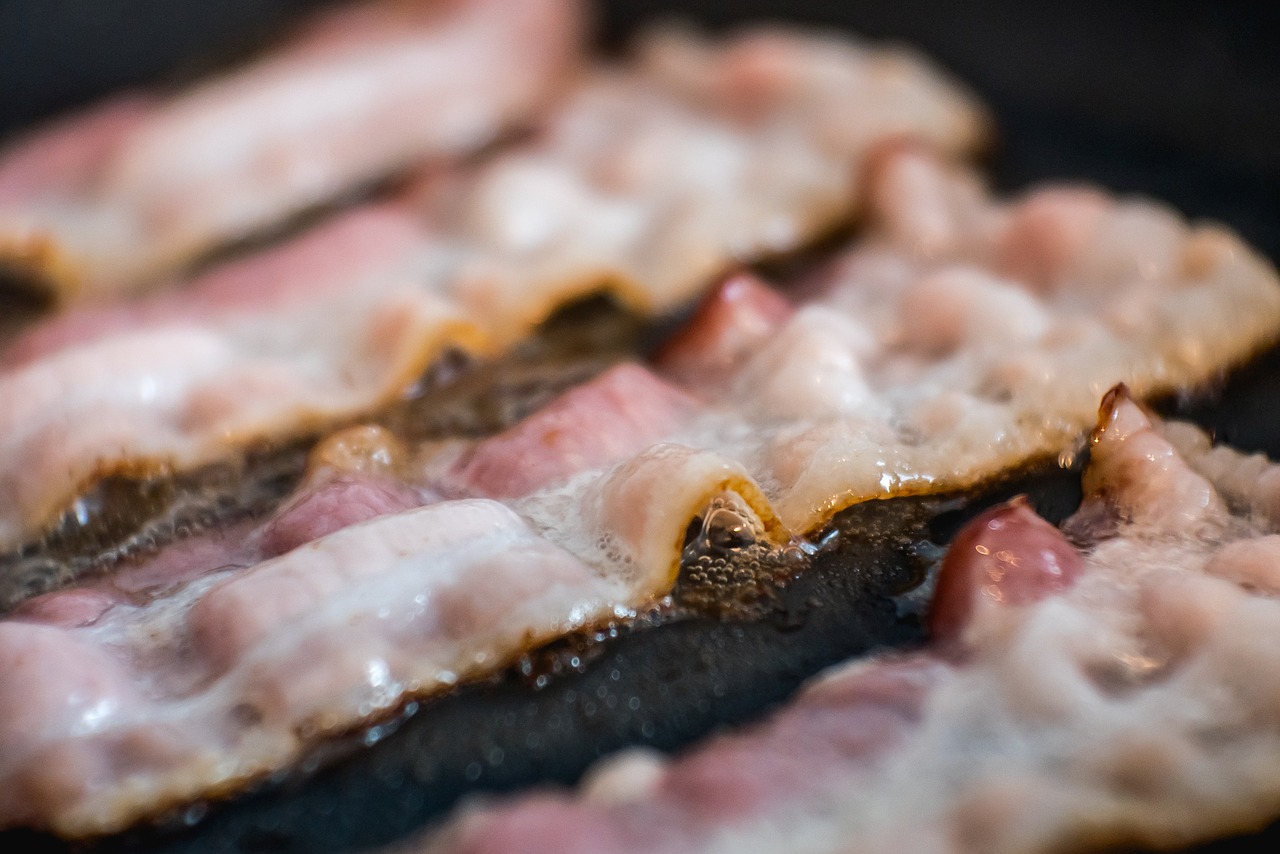 Image - sizzling hot bacon pieces food