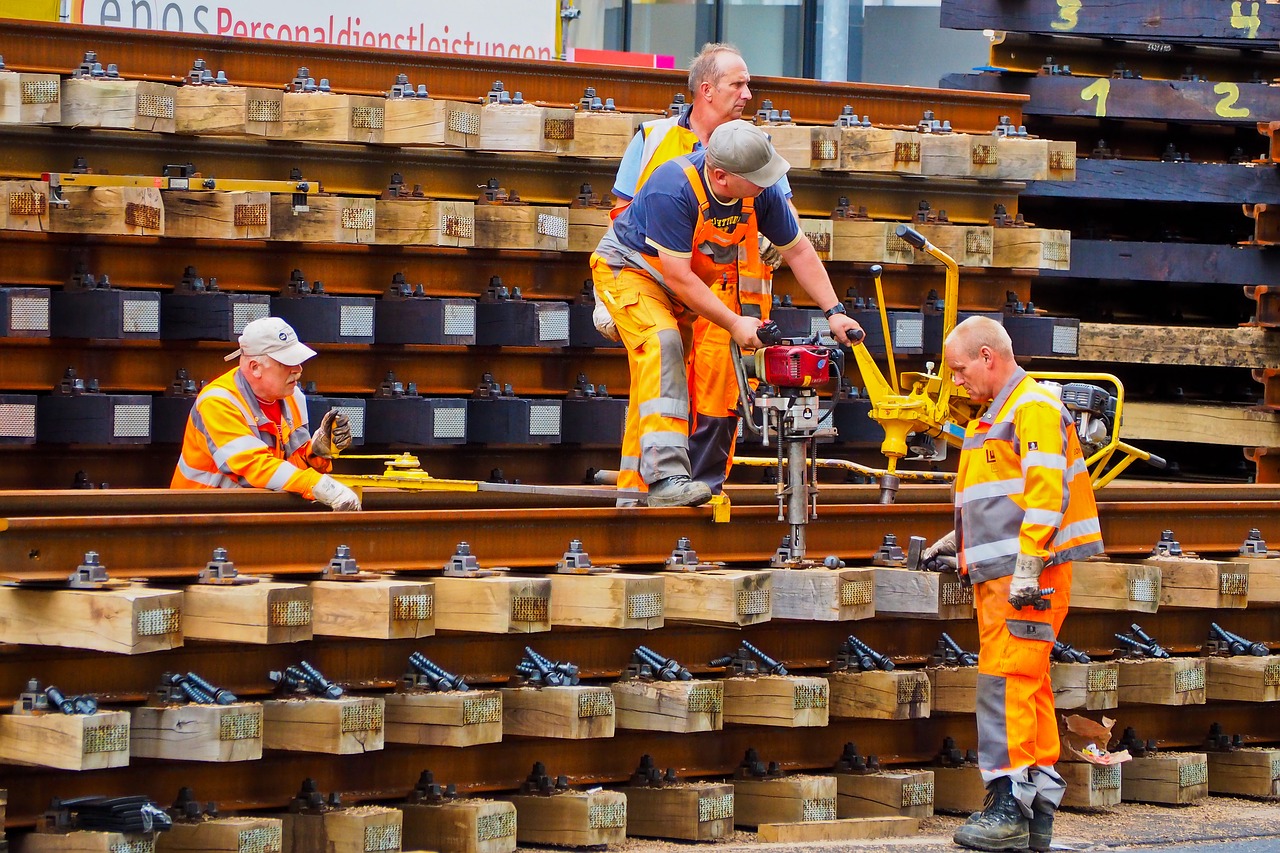 Image - workers track construction