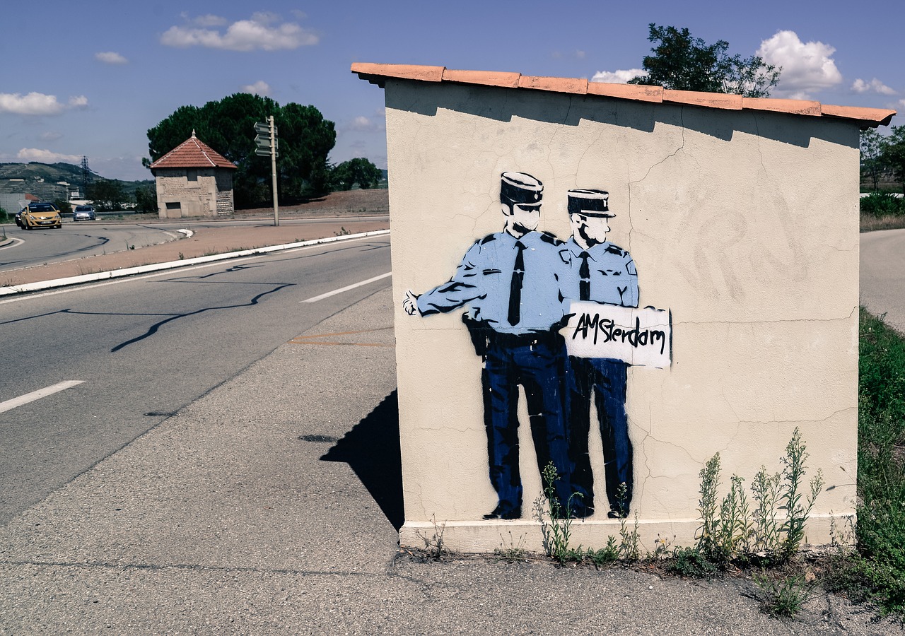 Image - hitchhiking cops mural paint art