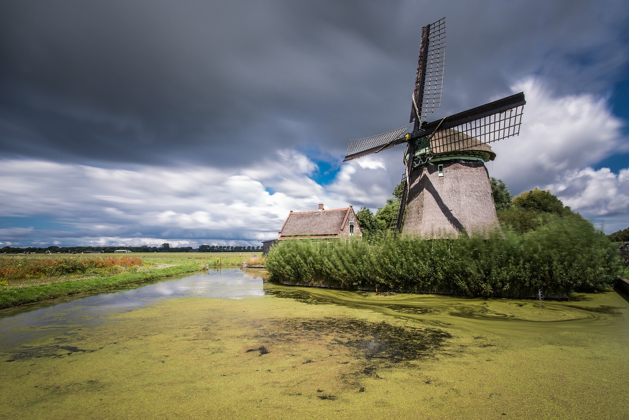 Image - windmill pond clouds sky landscape