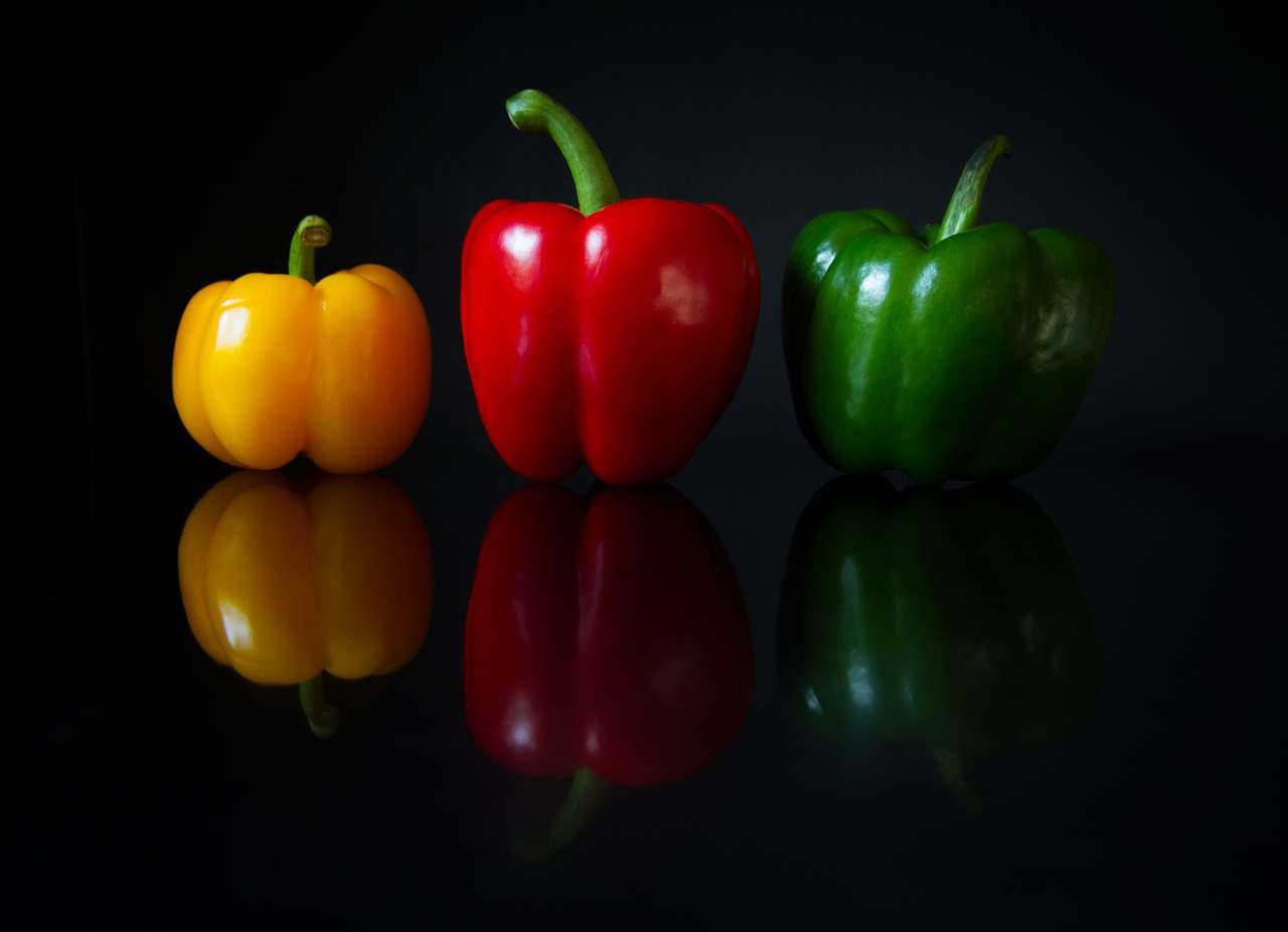 Image - colorful peppers black background