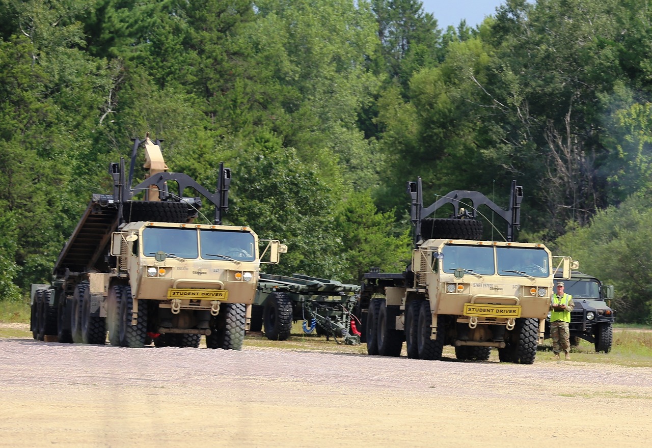Image - truck convoy armored camo desert