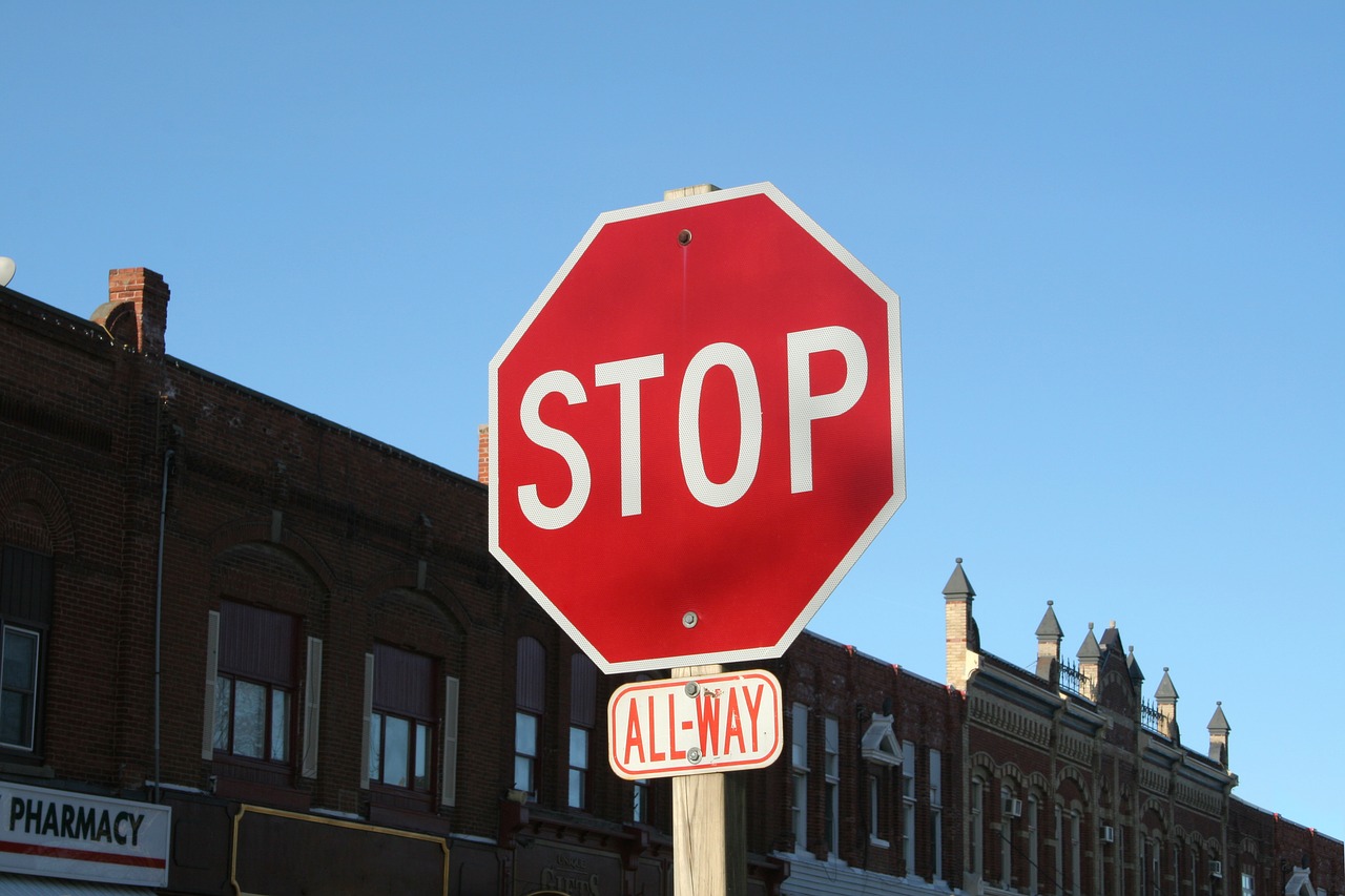 Image - stop sign city town traffic road