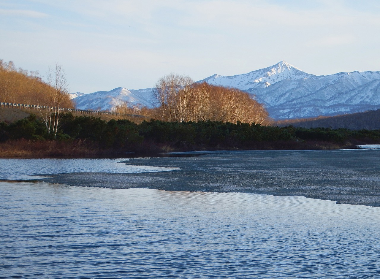 Image - spring lake ice mountains sky