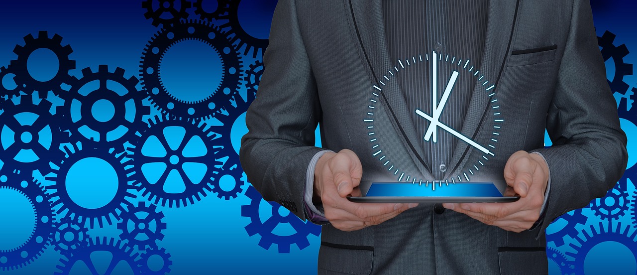 Image - time businessman tablet gears