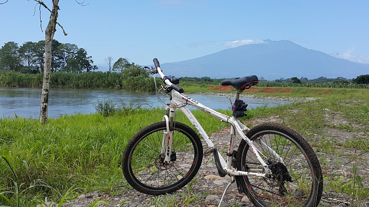 Image - bicycle river mountain