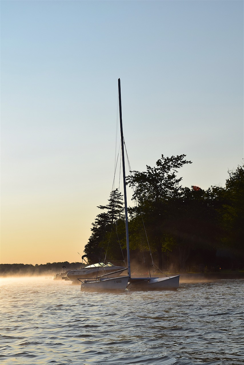 Image - sunrise lake mist boat sail boat