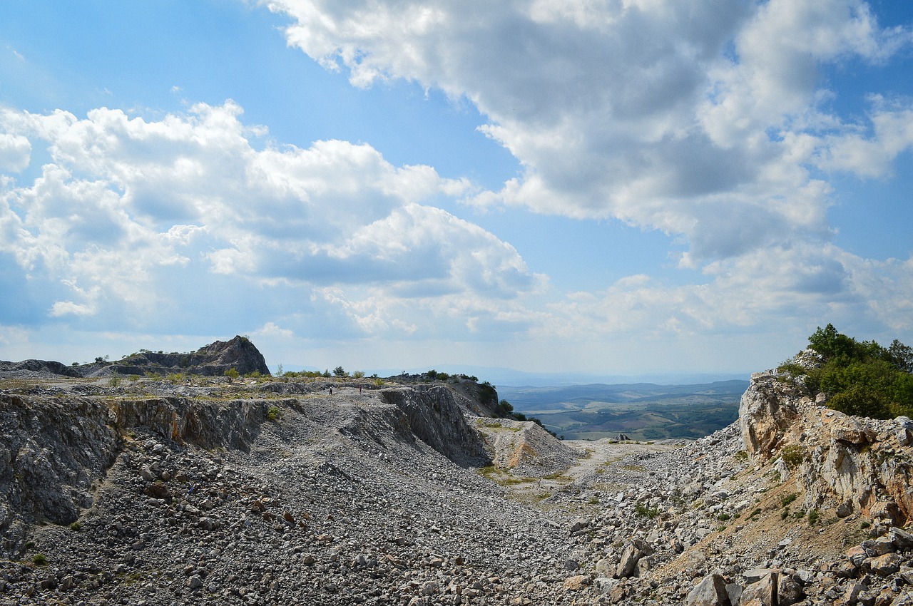 Image - stone mine sky blue clouds rock