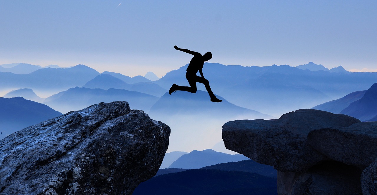 Image - cliff jump high rock boy