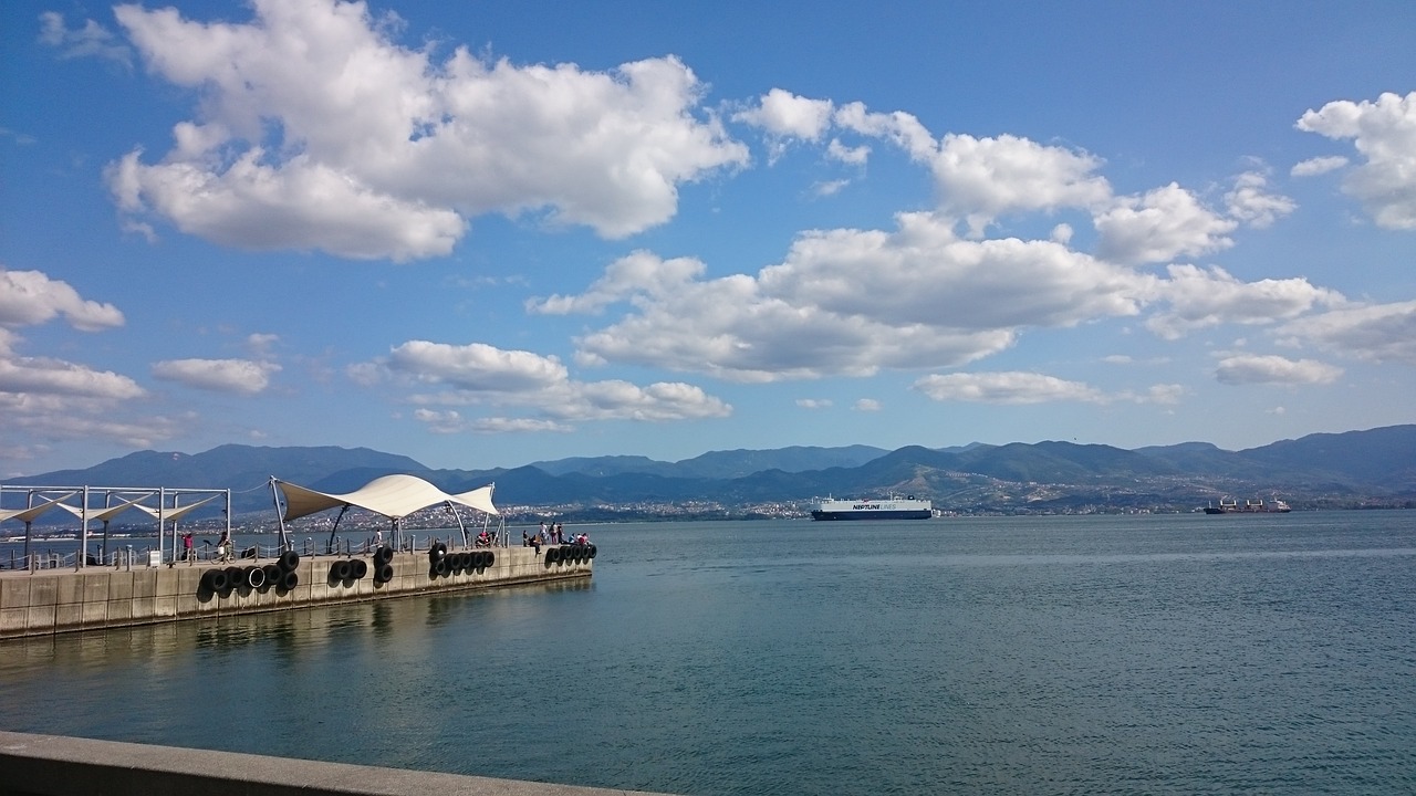 Image - ships seaside blue sky clouds