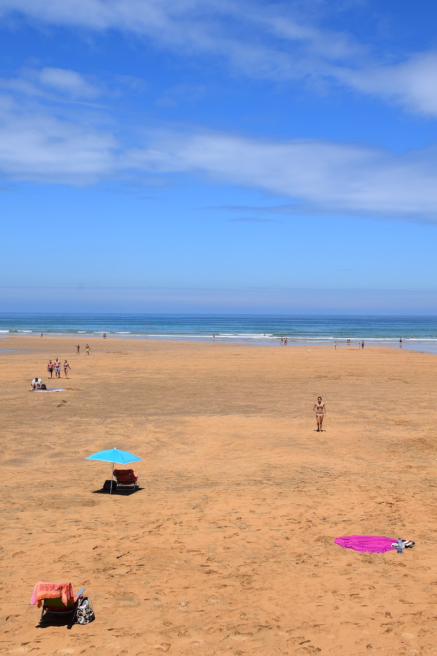 Image - beach parasol sea splash of color