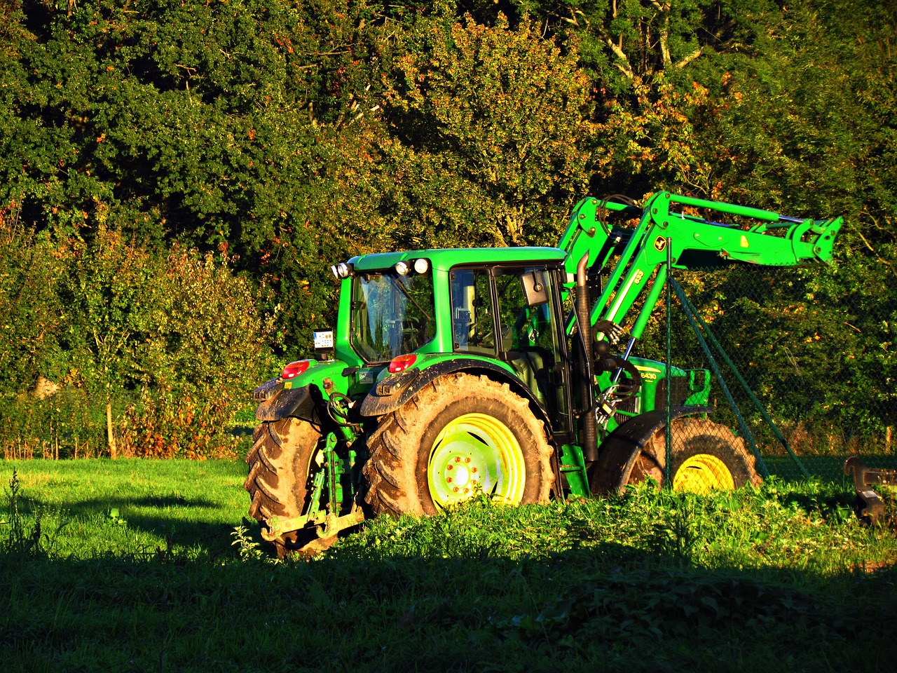 Image - field tractor agriculture village