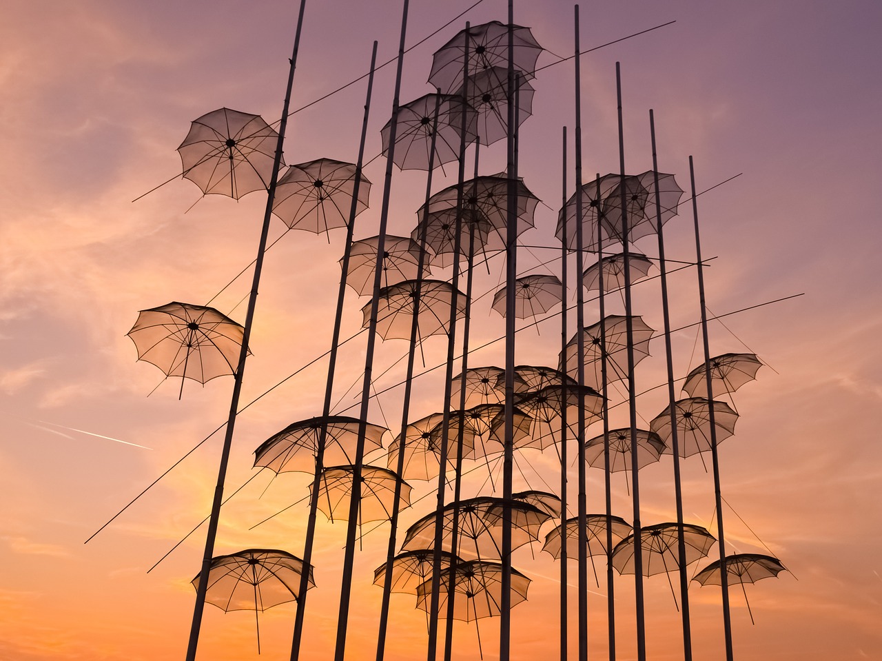 Image - umbrellas art sculpture sunset