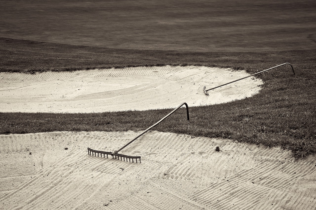 Image - golf course sand hole bunker rake