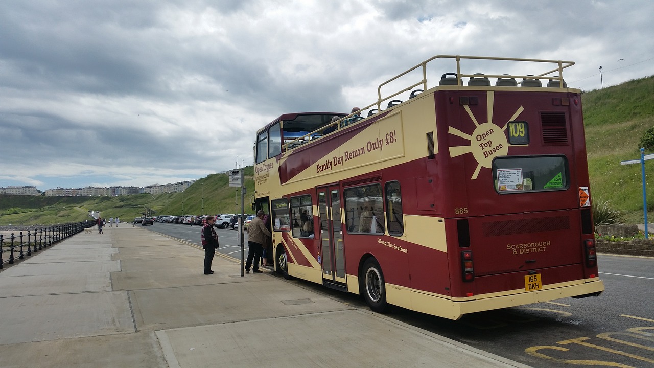 Image - open top bus beach seaside