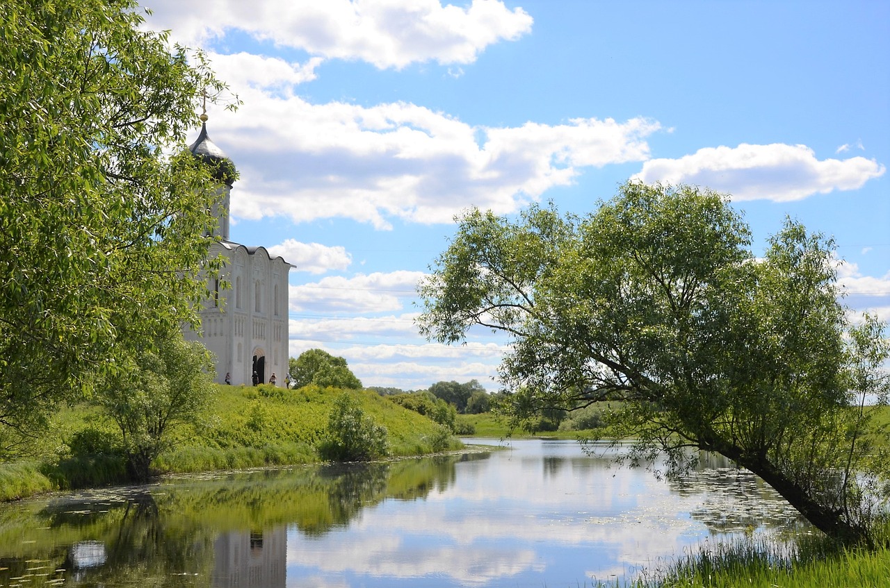 Image - river clouds sky church