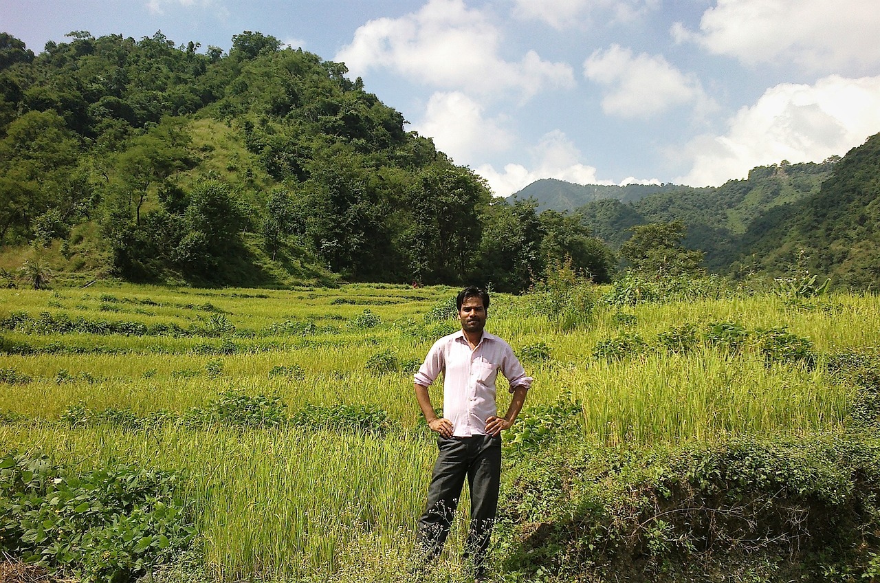 Image - man standing green field agriculture