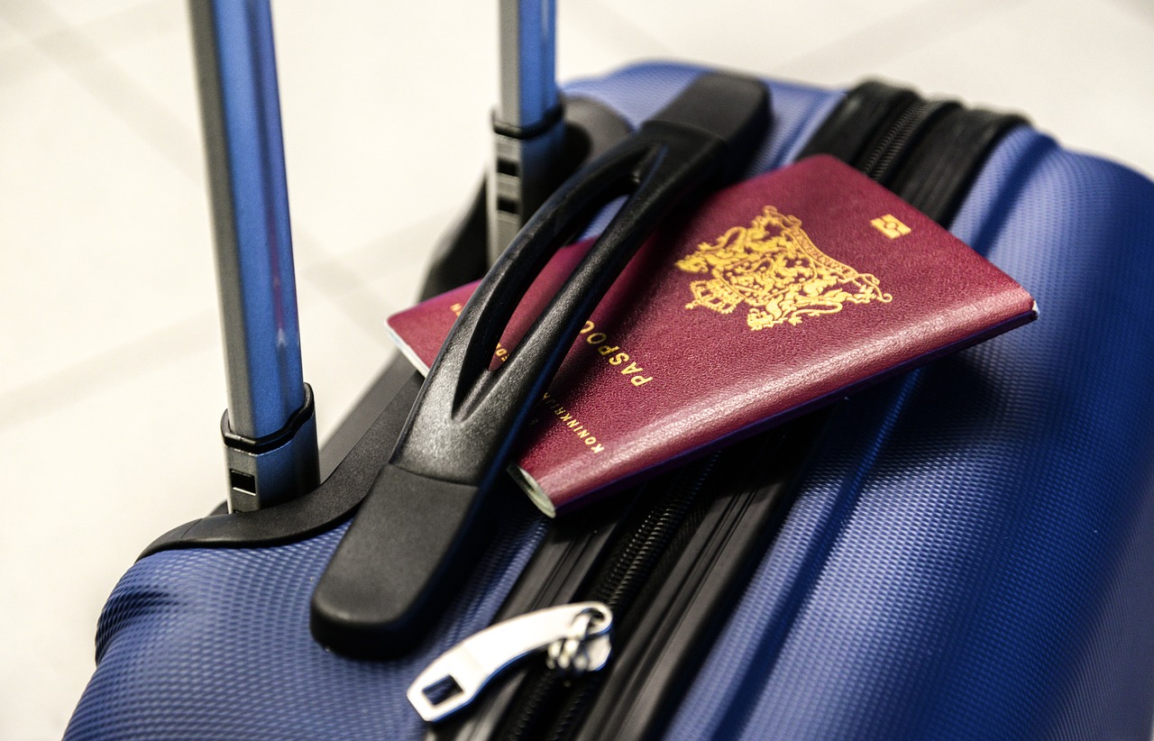 Image - passport luggage trolley travel