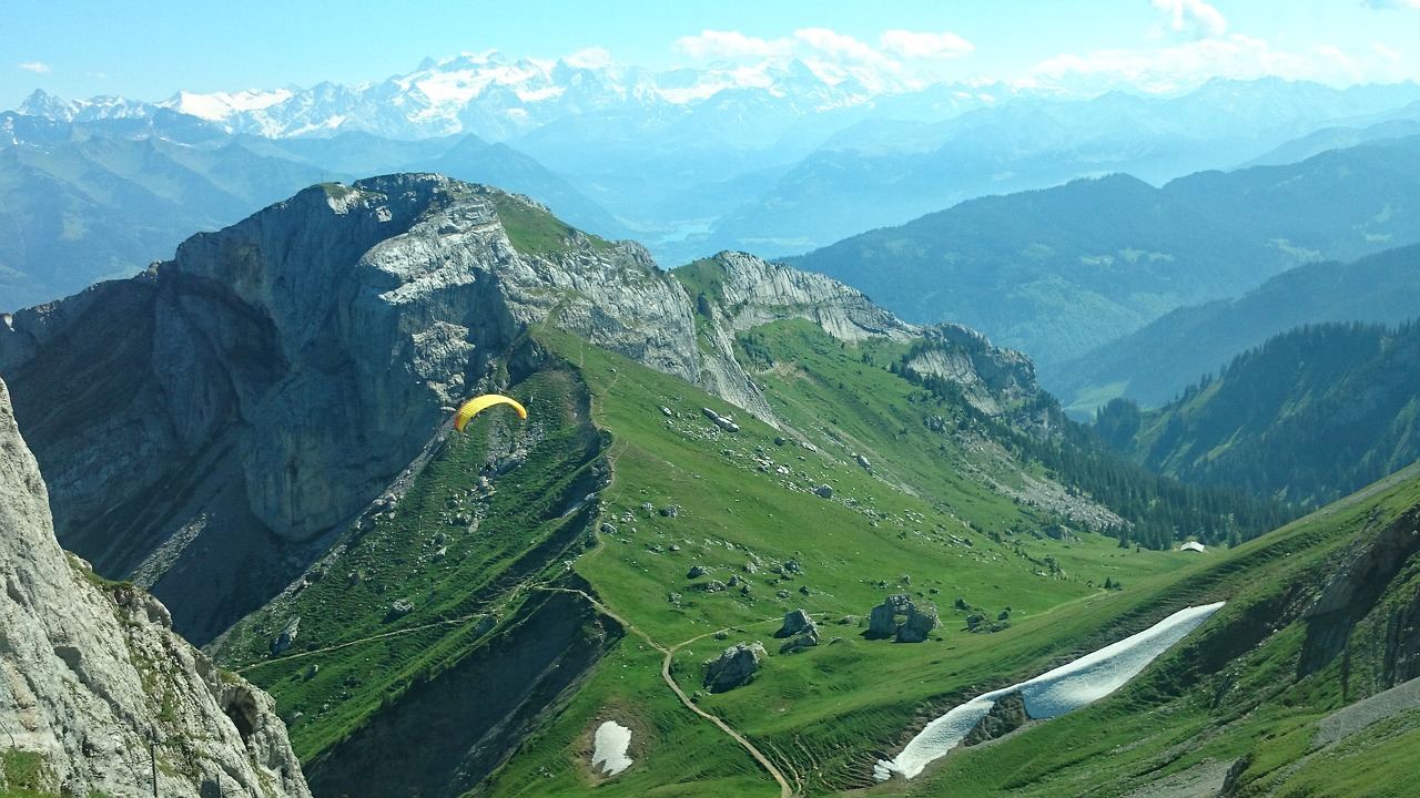 Image - skydiver mountains landscape