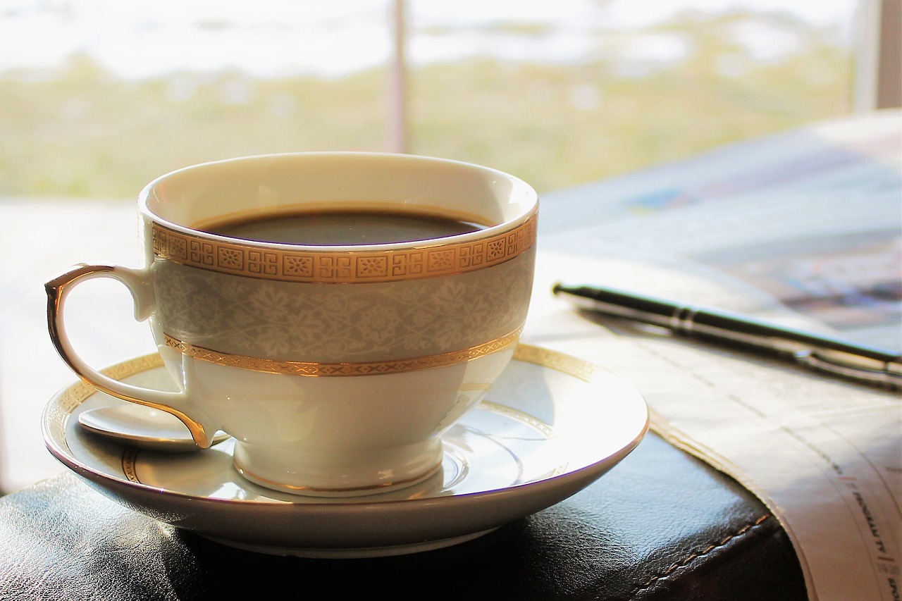 Image - coffee cozy at home newspaper