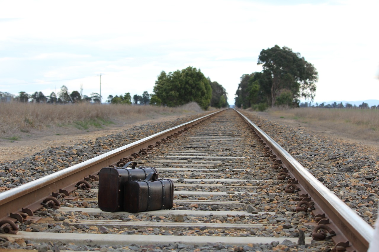 Image - suitcase cases train tracks