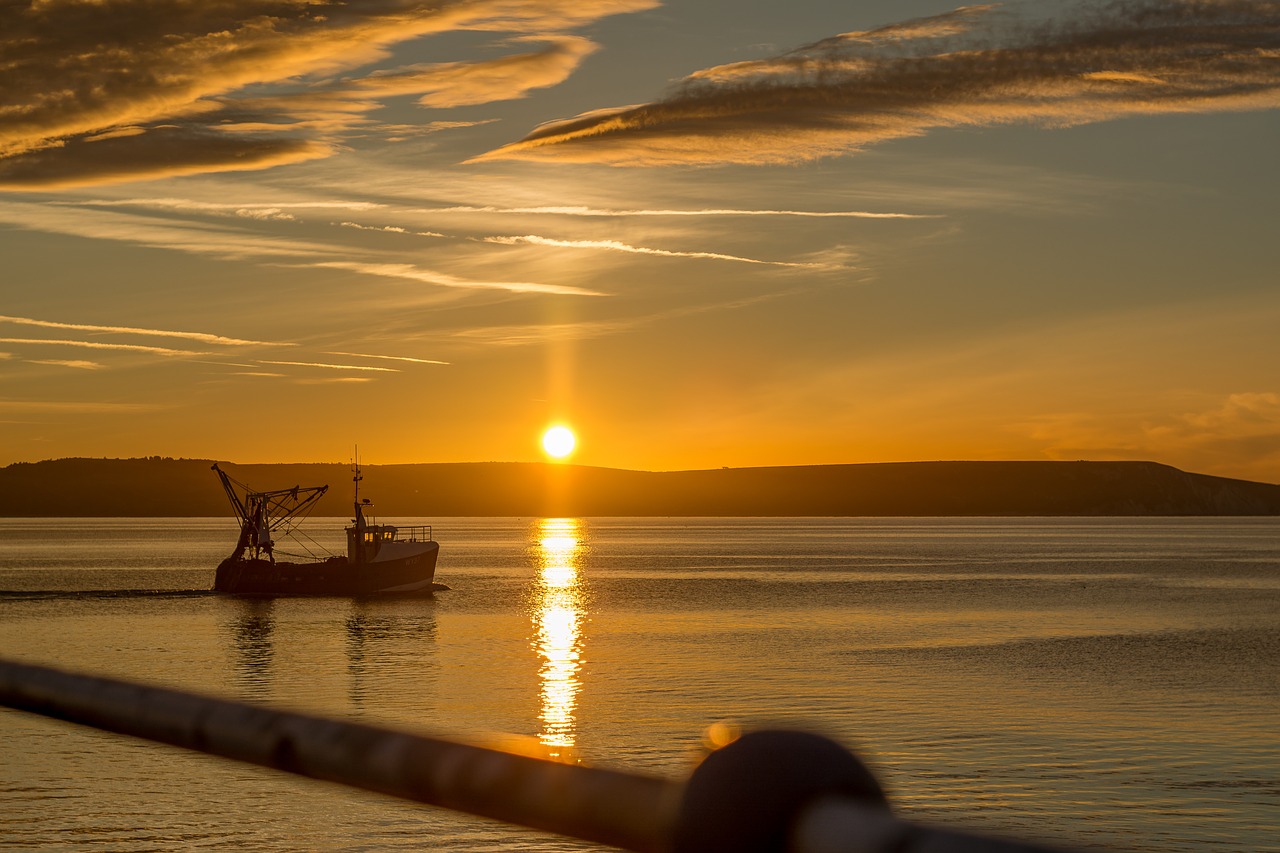 Image - sunrise weymouth trawler