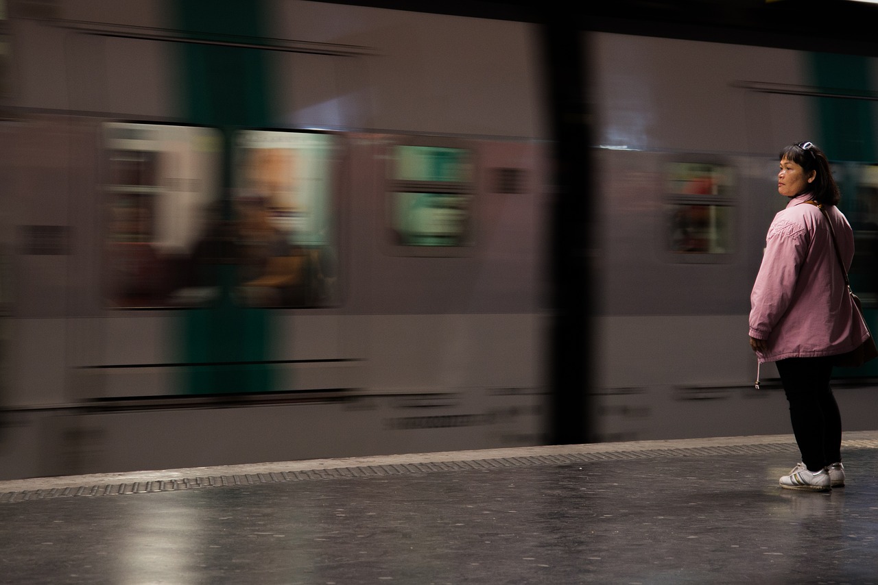 Image - woman station waiting metro train