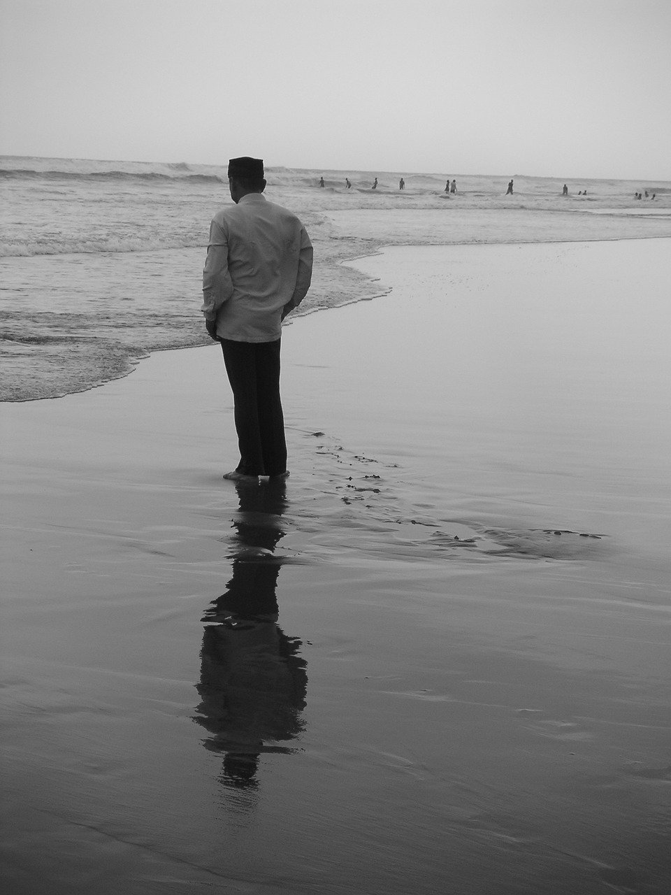 Image - human beach mirroring by the sea