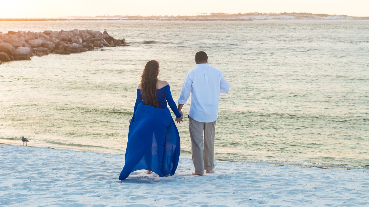 Image - sunset couple holding hands beach