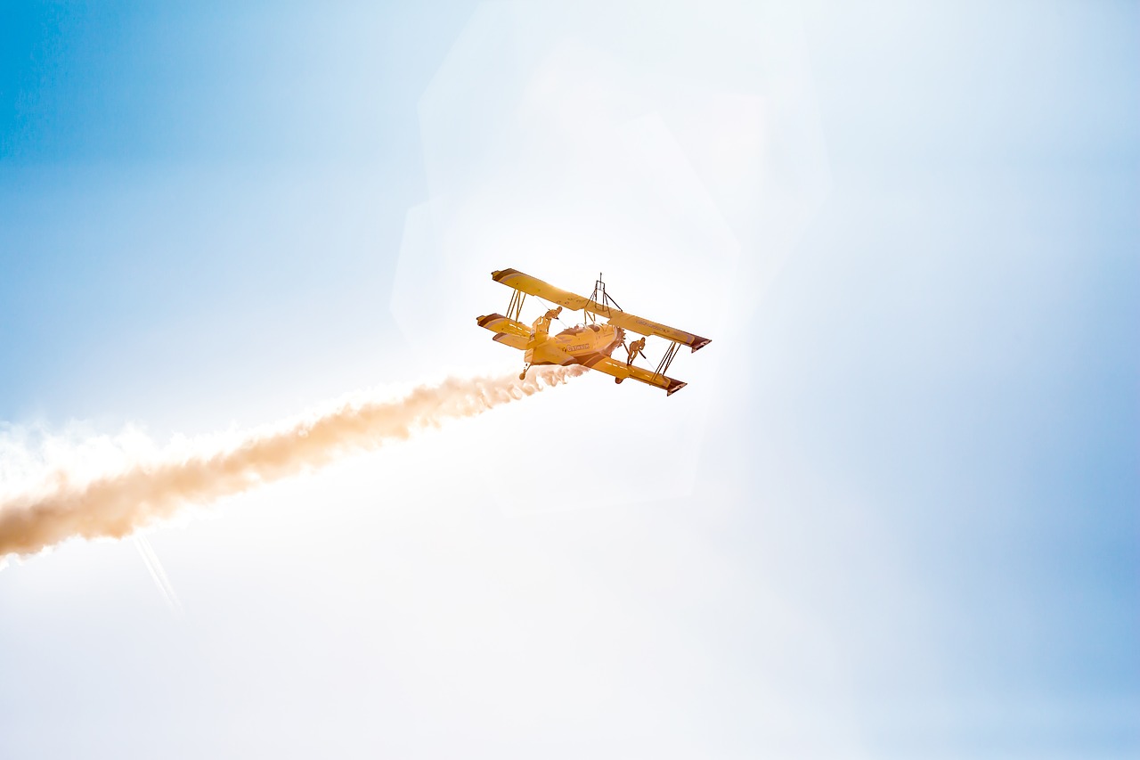 Image - aerobatic plane smoke cloud sky