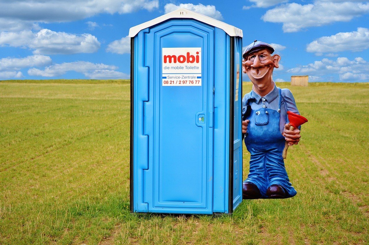 Image - plumber work dixi toilet dixi loo