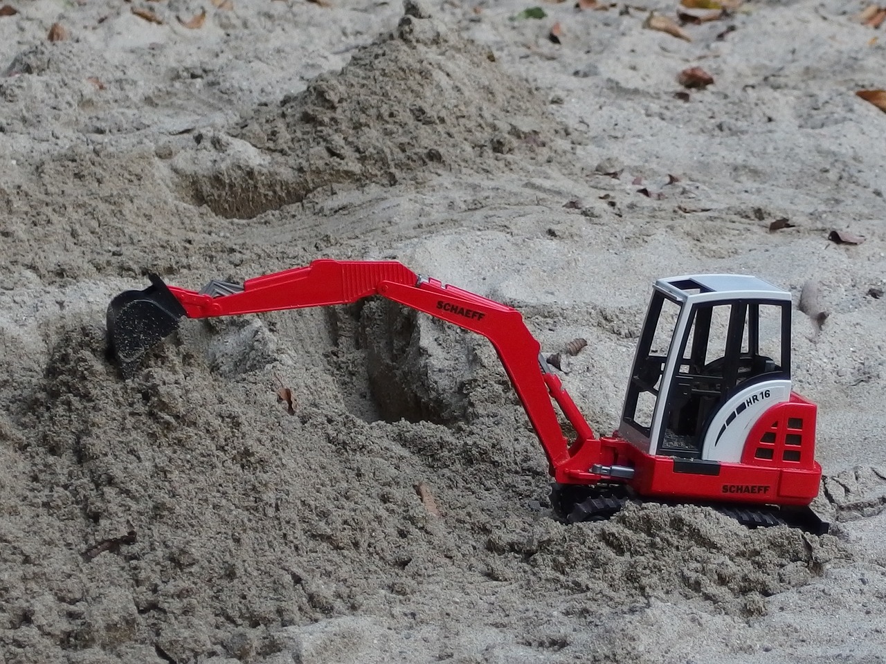 Image - excavators siku sand