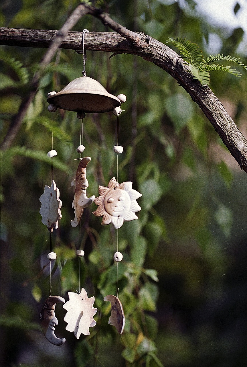 Image - wind chime tree sun moon clay