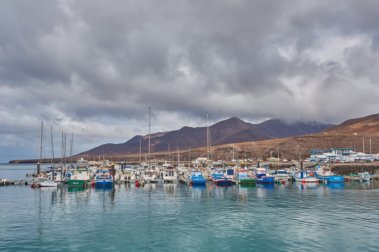 Image - port fishing boats coast hill sea