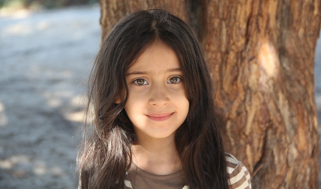 Image - little girl in the garden portrait