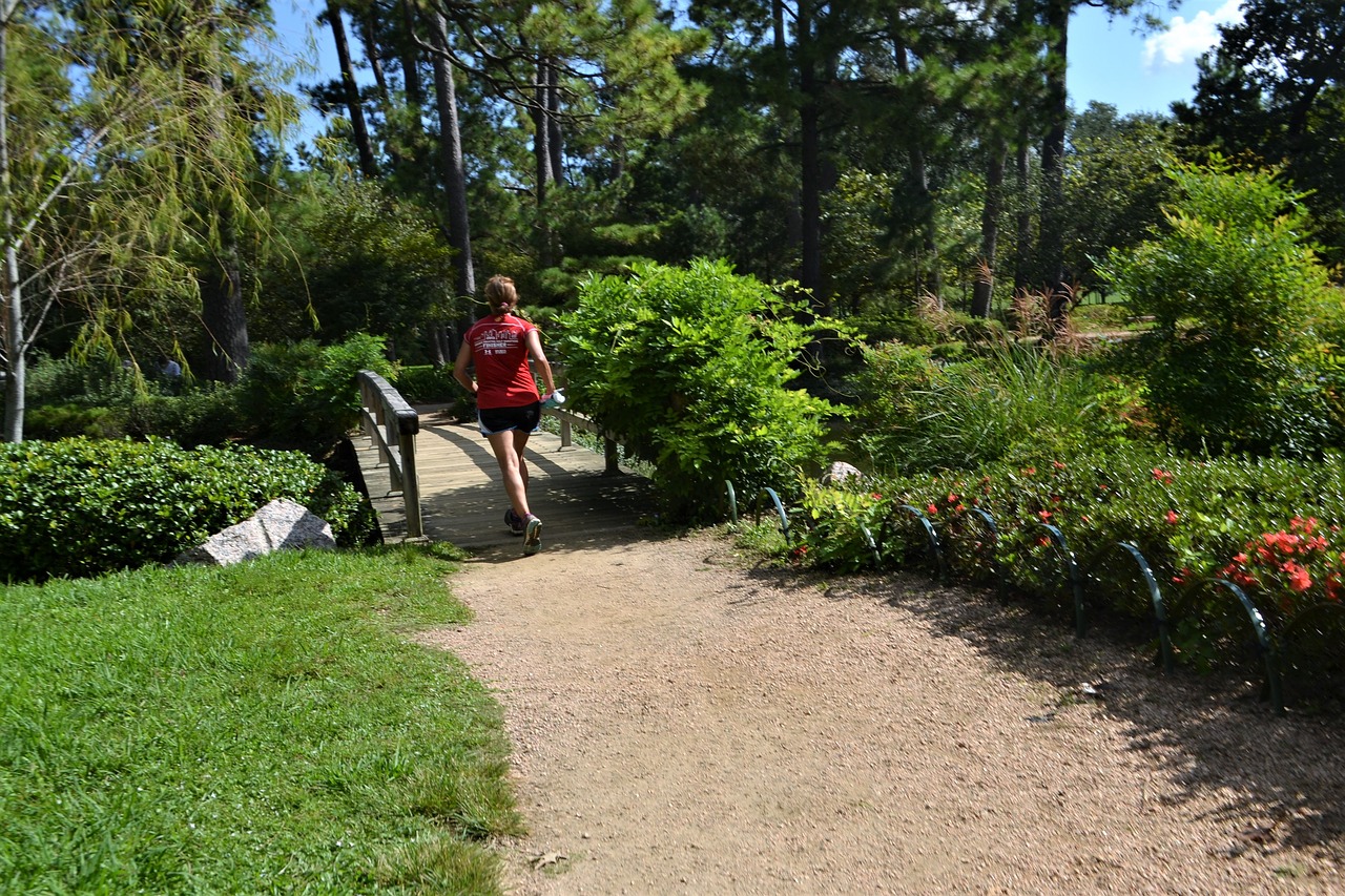 Image - female jogger running green