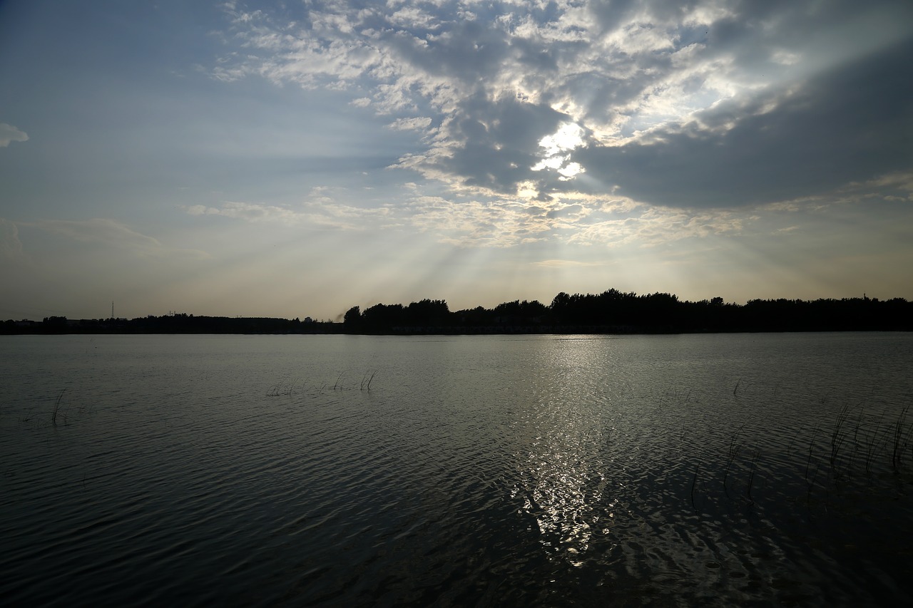 Image - sunshine beam black cloud the water