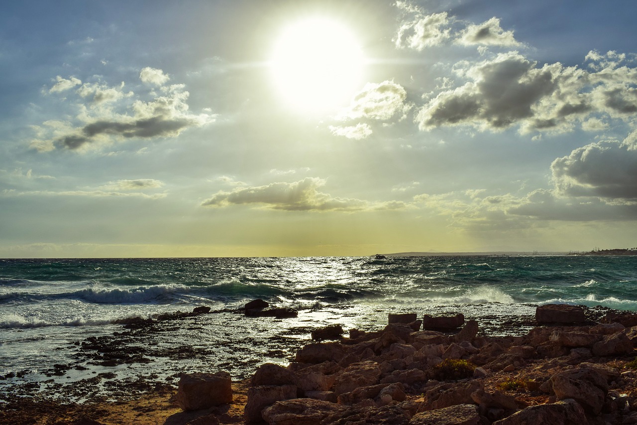 Image - rocky coast sea sky clouds waves