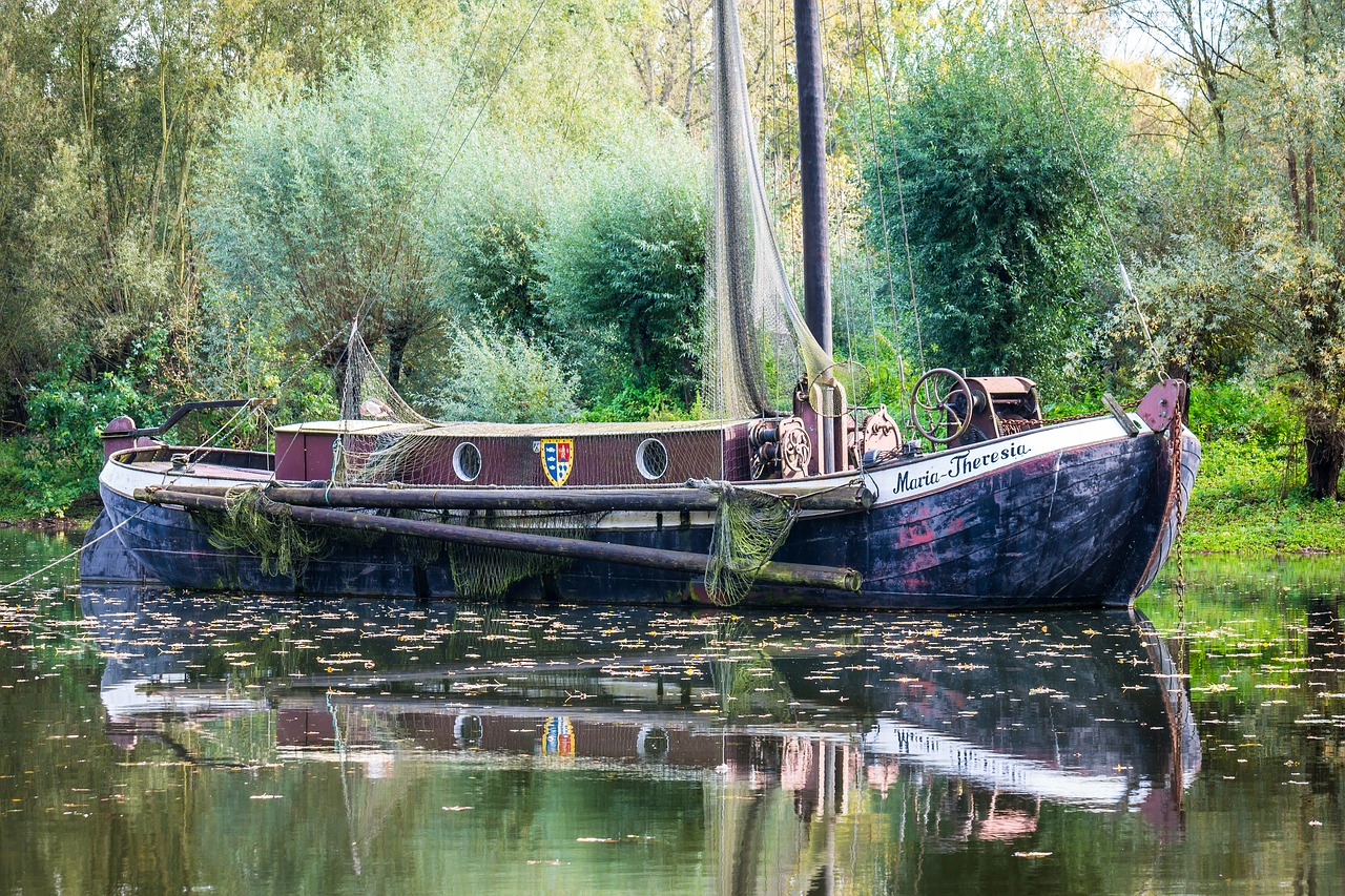 Image - fishing boat ship mirroring lake