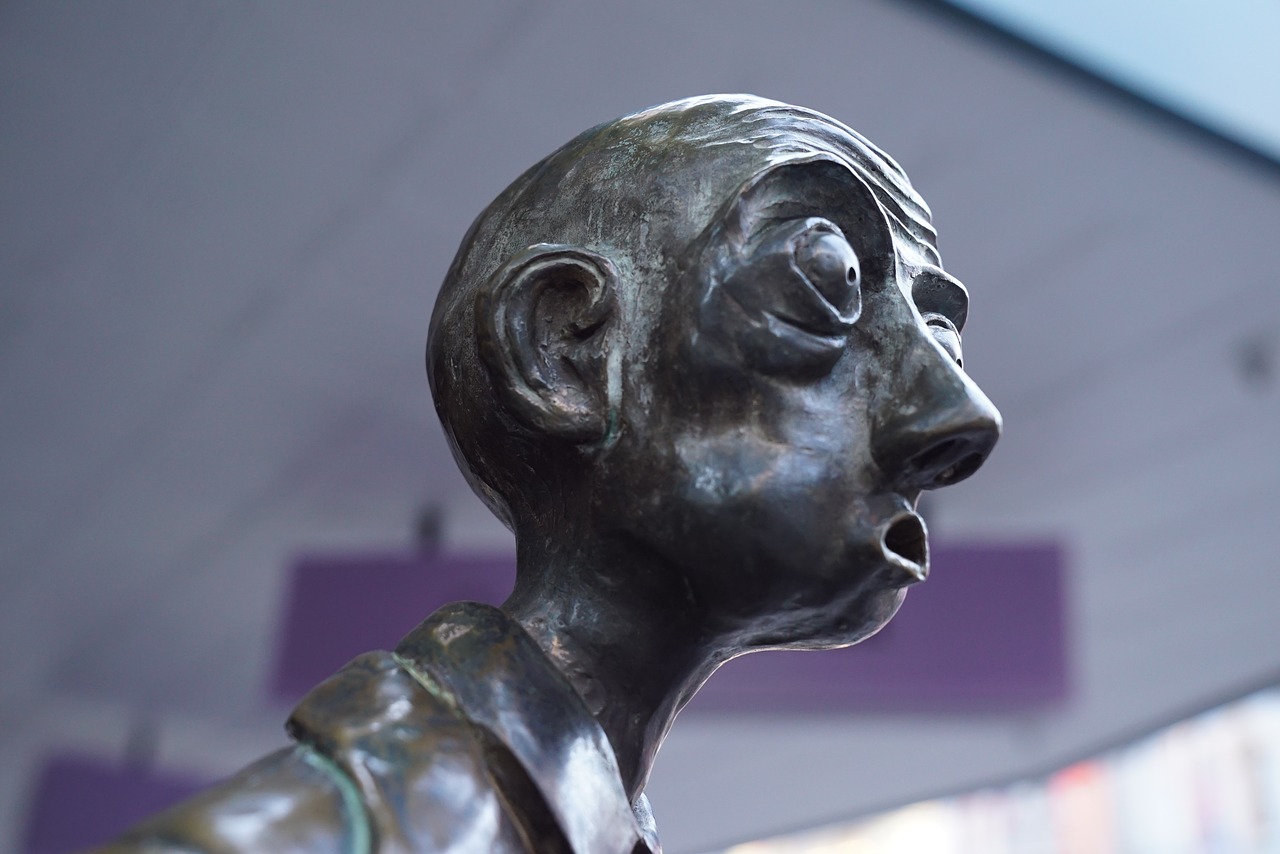 Image - street sculpture three businessmen